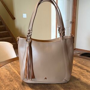 Izzy & Ali Tan Handbag with Tassel & Braided Accents with Detachable Long Strap